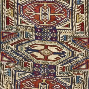 Close-up of geometric patterns in a Caucasian rug by Rugs On Net