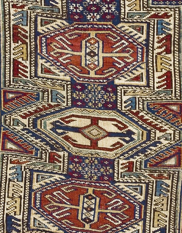 Close-up of geometric patterns in a caucasian rug by rugs on net