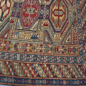 Close-up of geometric patterns on the Kazak rug by Rugs On Net. by Rugs On Net
