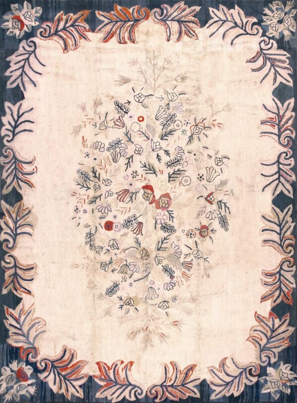 Oversized early 20th century american hooked wool scattered naive bouquet cream field rug by rugs on net