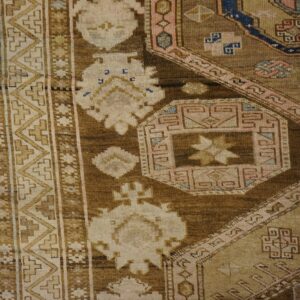 Close-up of a brown and cream geometric rug detail by Rugs On Net. by Rugs On Net