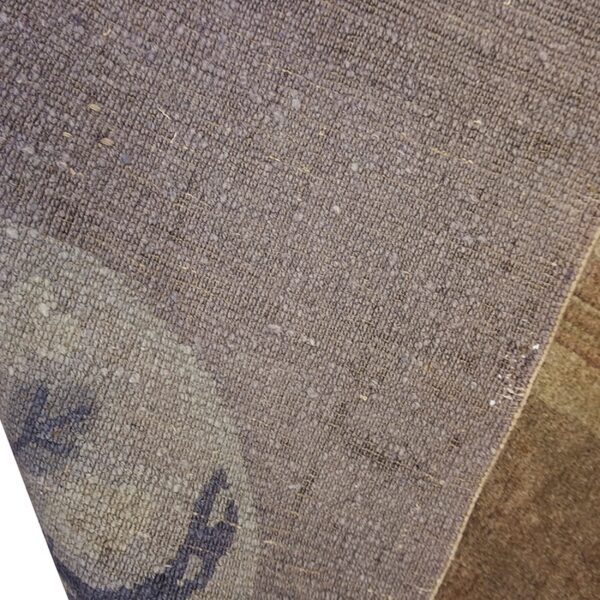 Close-up view of the woven texture of the vintage kilim rug by rugs on net. By rugs on net