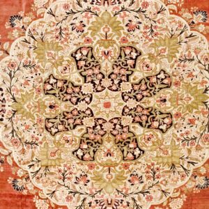 Close-up of a richly detailed floral medallion design on a rust-colored rug by Rugs On Net. by Rugs On Net