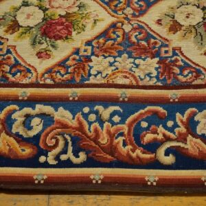 Close-up of a floral needlepoint rug border by Rugs On Net. by Rugs On Net