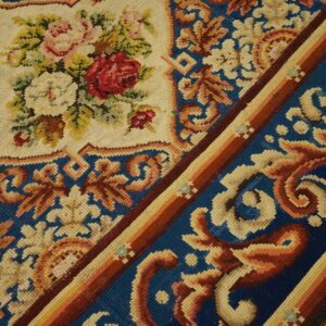 Close-up of a floral needlepoint rug detail by Rugs On Net