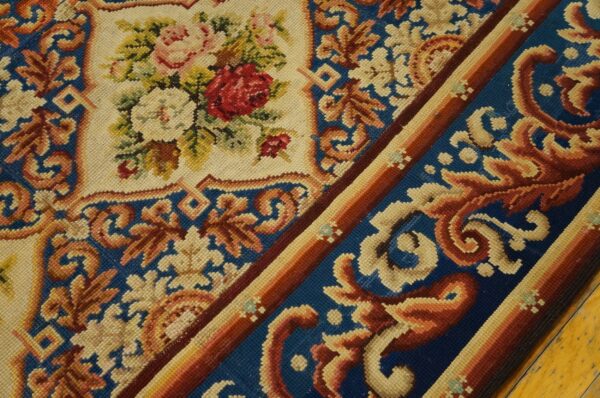 Close-up of a floral needlepoint rug detail by rugs on net