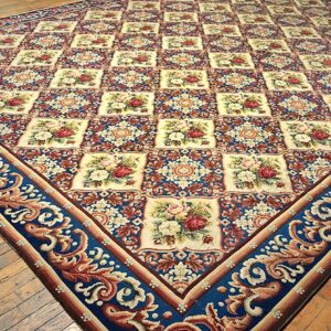 Close-up of a floral tapestry rug with blue borders by Rugs On Net