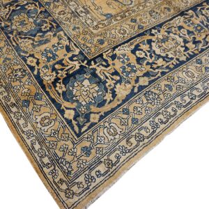Corner detail of a blue and tan traditional rug by Rugs On Net. by Rugs On Net