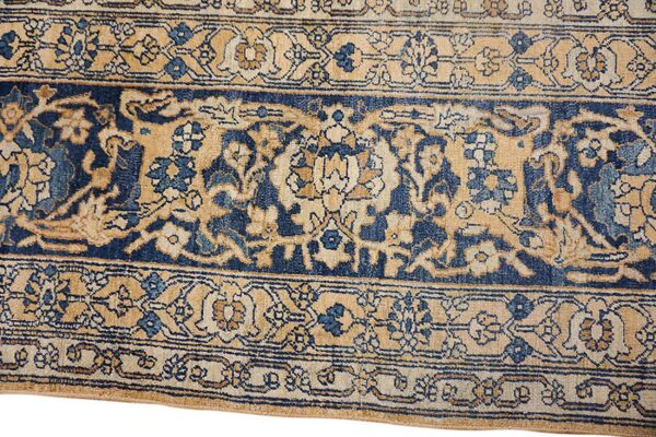 Close-up of the border detail on the blue and tan rug by rugs on net. By rugs on net