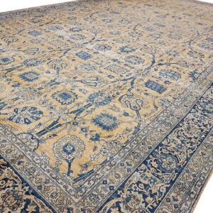 Close-up view of a beige and blue floral patterned rug by Rugs On Net. by Rugs On Net