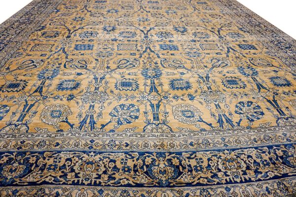 Close-up of a gold and blue patterned rug by rugs on net