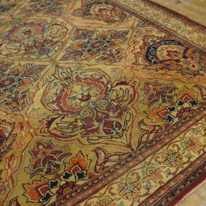 Close-up of a gold and rust-toned ornate Persian rug design by Rugs On Net. by Rugs On Net