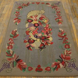 Hooked rug featuring a central fruit arrangement framed by autumn leaves and grapes, by Rugs On Net