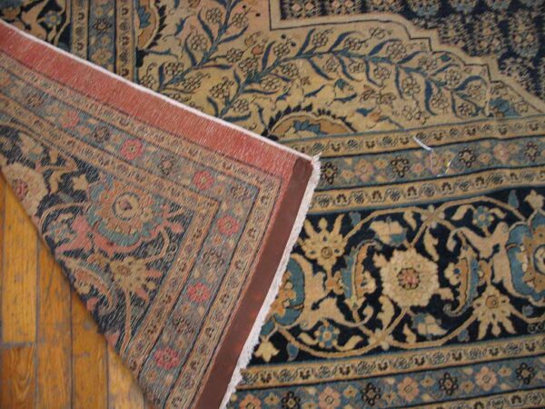 Close-up showing the detailed border and field of the persian rug by rugs on net. By rugs on net