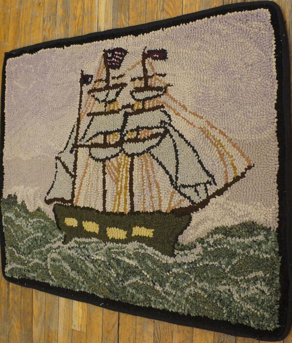 Hooked rug depicting a historic sailing ship on rough seas by rugs on net