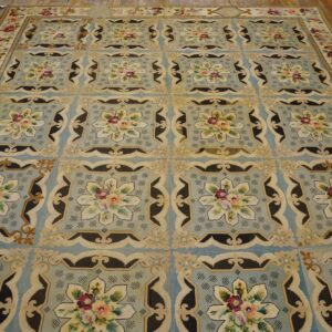 A light blue rug with repeating floral medallions in cream and dark accents, by Rugs On Net. by Rugs On Net
