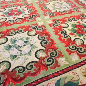 Close-up of a vibrant green and red floral tapestry rug by Rugs On Net. by Rugs On Net