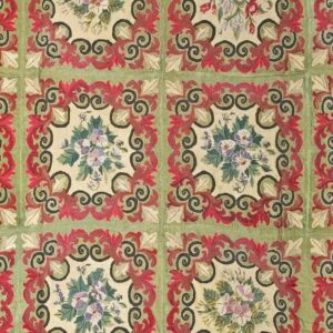 Close-up of a floral tapestry with green, red, and cream tones, featuring repeating square motifs with pansies, by Rugs On Net. by Rugs On Net