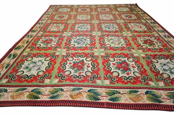 Green and red floral embroidered rug with a tiled pattern by rugs on net
