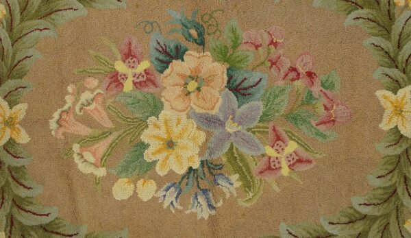 Close-up of a floral bouquet on a tan background, featuring yellow, pink, and purple flowers, by rugs on net