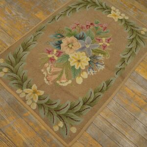 A close-up of the Floral Bouquet Hooked Rug on wooden flooring by Rugs On Net. by Rugs On Net