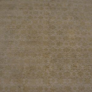 Close-up texture of a faded beige rug with subtle floral patterns by Rugs On Net. by Rugs On Net