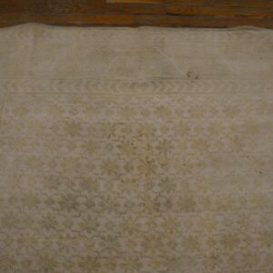 Close-up of a light beige, subtly patterned rug detail by Rugs On Net. by Rugs On Net