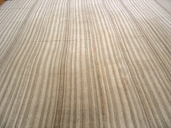 Close-up of a beige striped kilim rug pattern by rugs on net