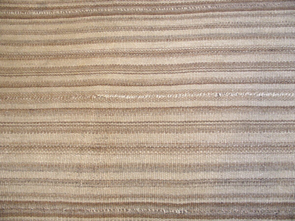 Close-up of beige striped rug texture by rugs on net