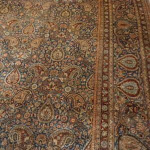 Close-up of a blue Persian rug featuring intricate paisley and floral patterns by Rugs On Net. by Rugs On Net