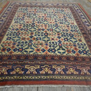 Close-up view of a traditional floral rug with cream, blue, and coral accents by Rugs On Net. by Rugs On Net