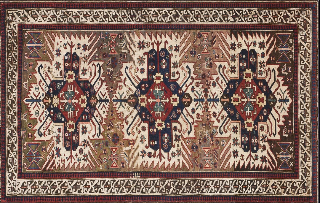 Small antique earth tone caucasian tribal geometric birds eagle kazak design seychour rug