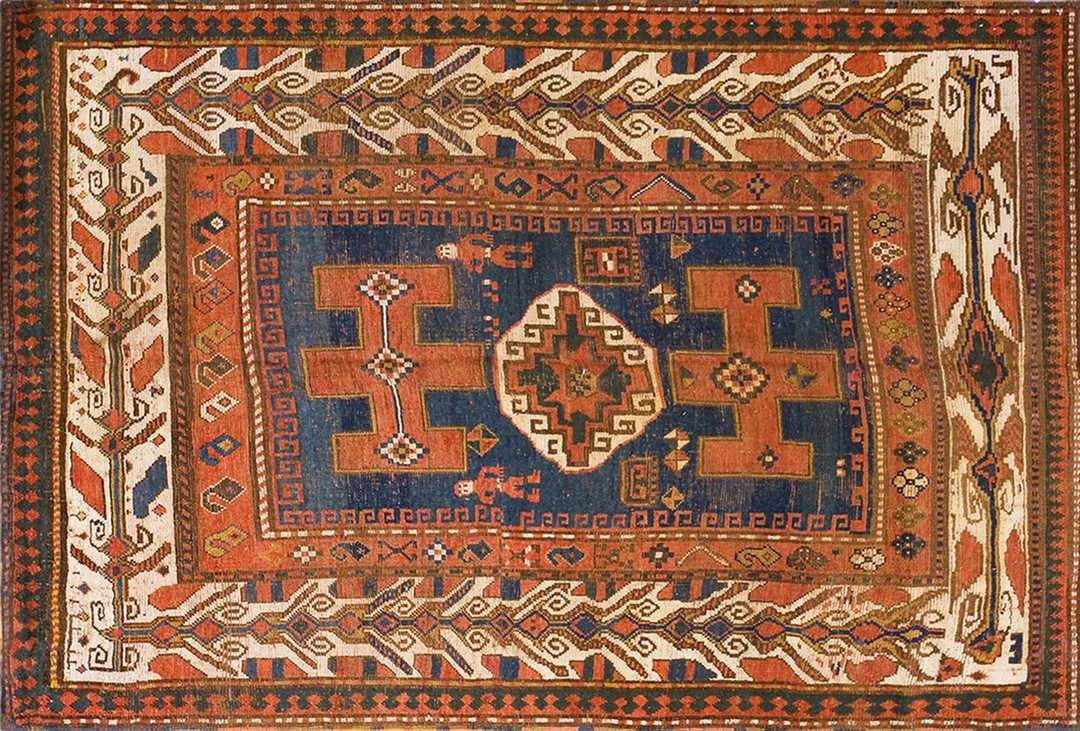 Blue ground tribal geometric figural pattern antique caucasian kazak rug