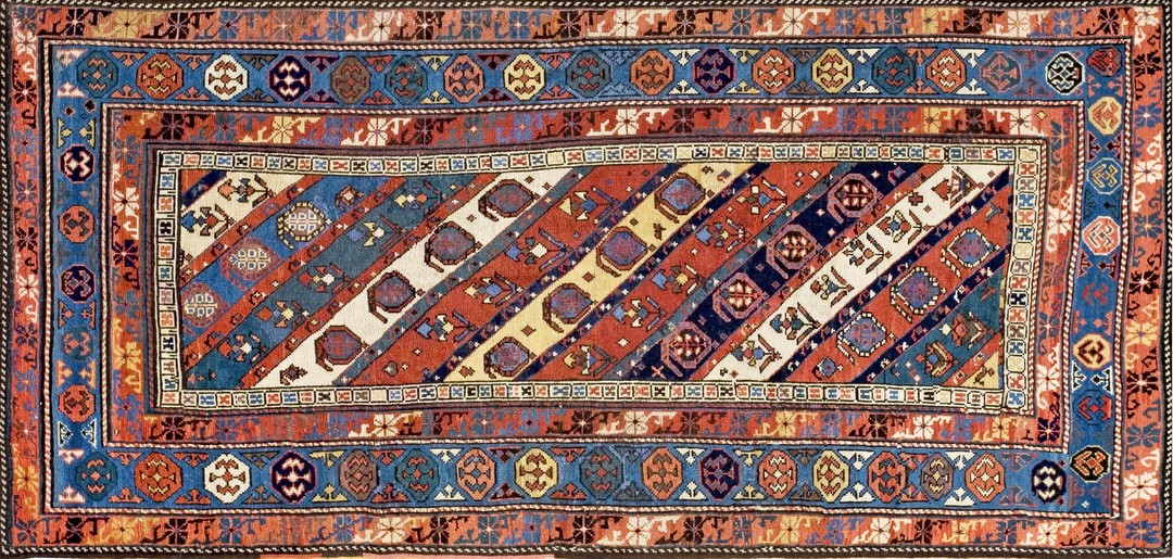 Antique late 19th century tribal geometric caucasian kazak paisley pattern runner rug