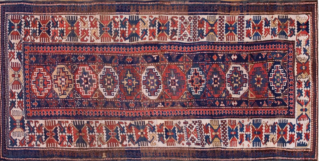 Tribal geometric colorful jewel tone antique caucasian kazak rug