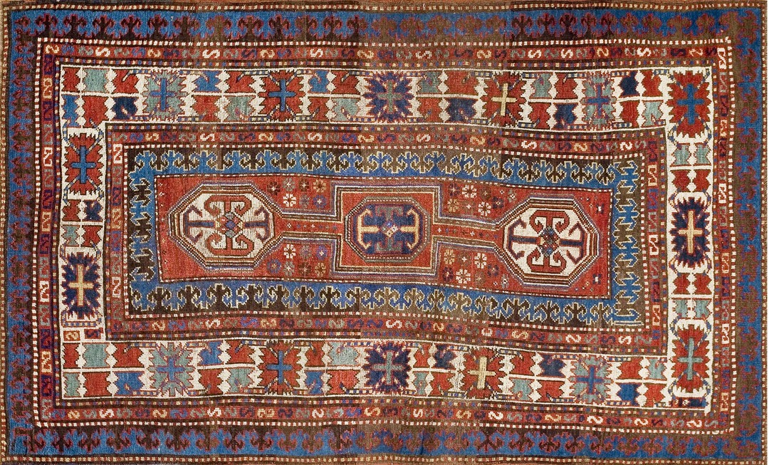 Antique caucasian tribal geometric key hole design medallion kazak rug