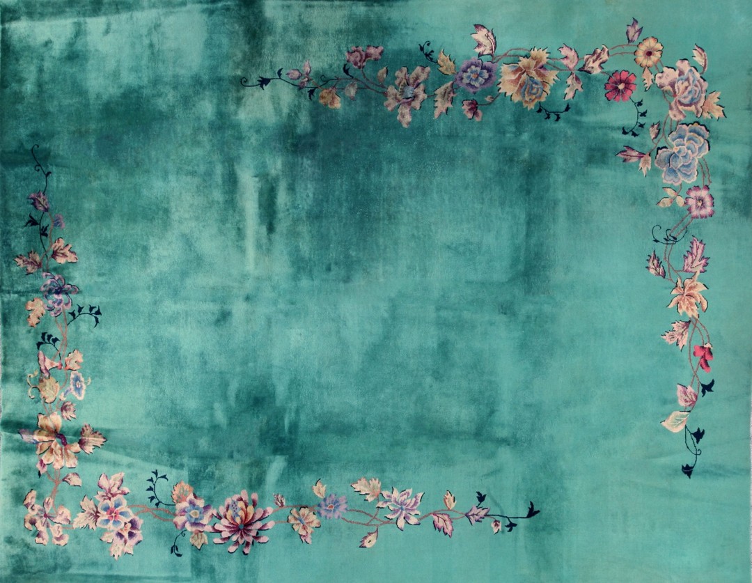 Minimalist open solid turquoise color field antique room size floral chinese art deco rug