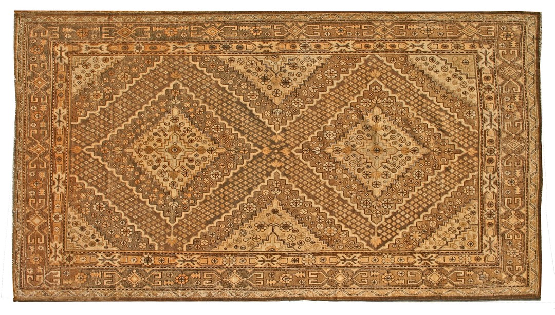 Antique geometric diamond pattern east turkestan earthy color khotan rug