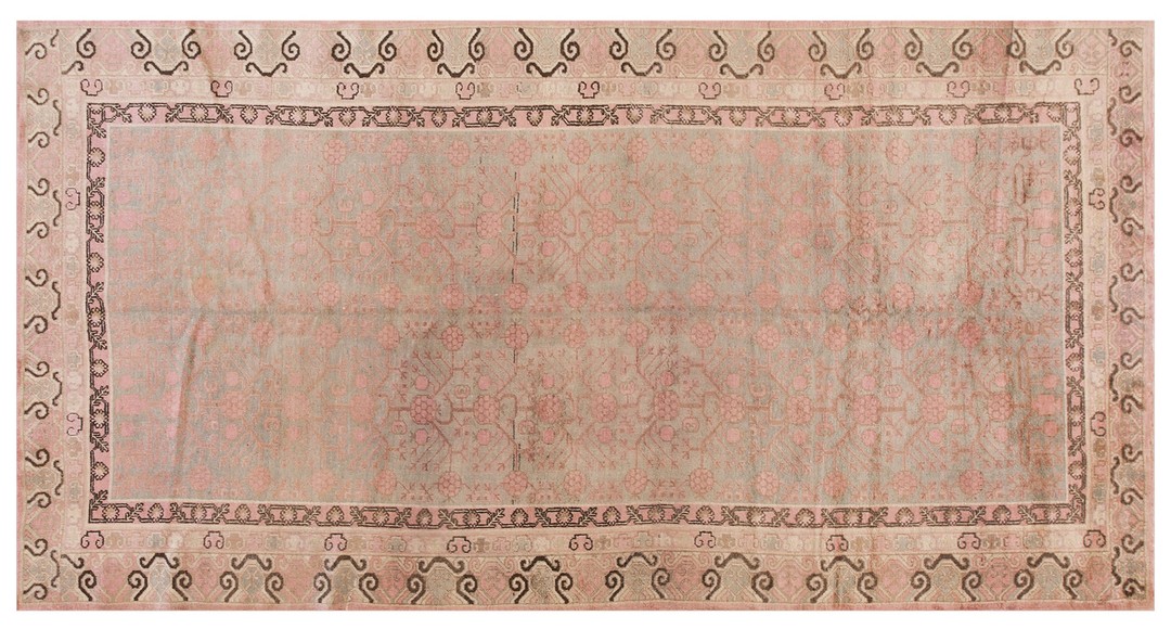 Antique khotan allover geometric pomegranate pattern east turkestan hand knotted pile rug