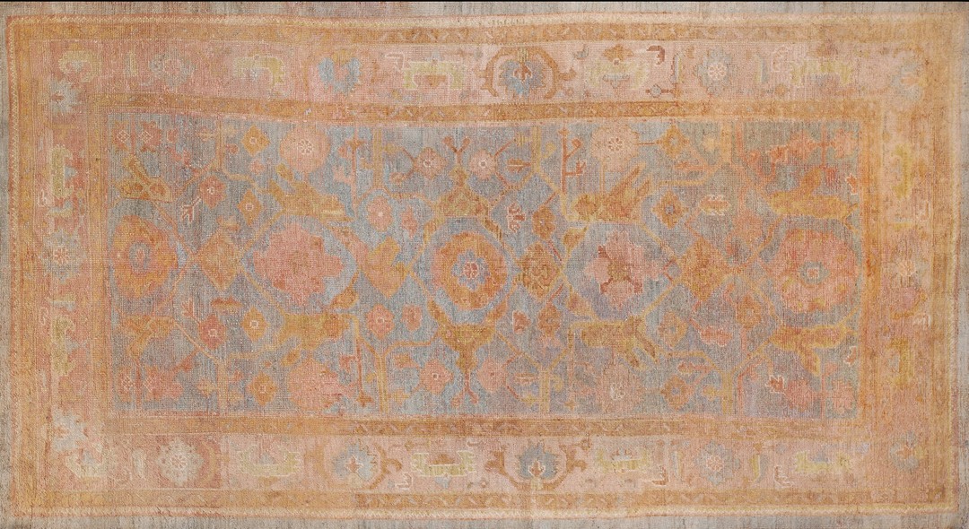 Decorative antique faded blue color small size tribal turkish oushak area rug