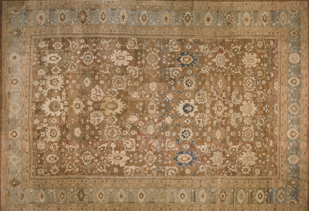 Decorative neutral brown earthy color tribal antique oversized persian sultanabad carpet
