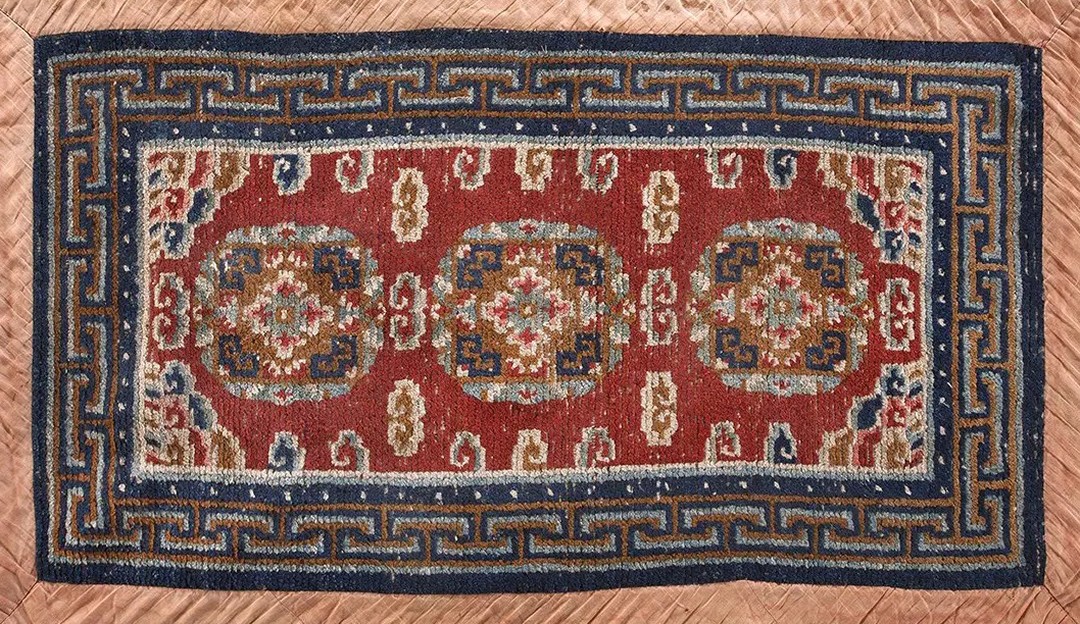 Red field antique small scatter size wool pile cloud band tibetan rug