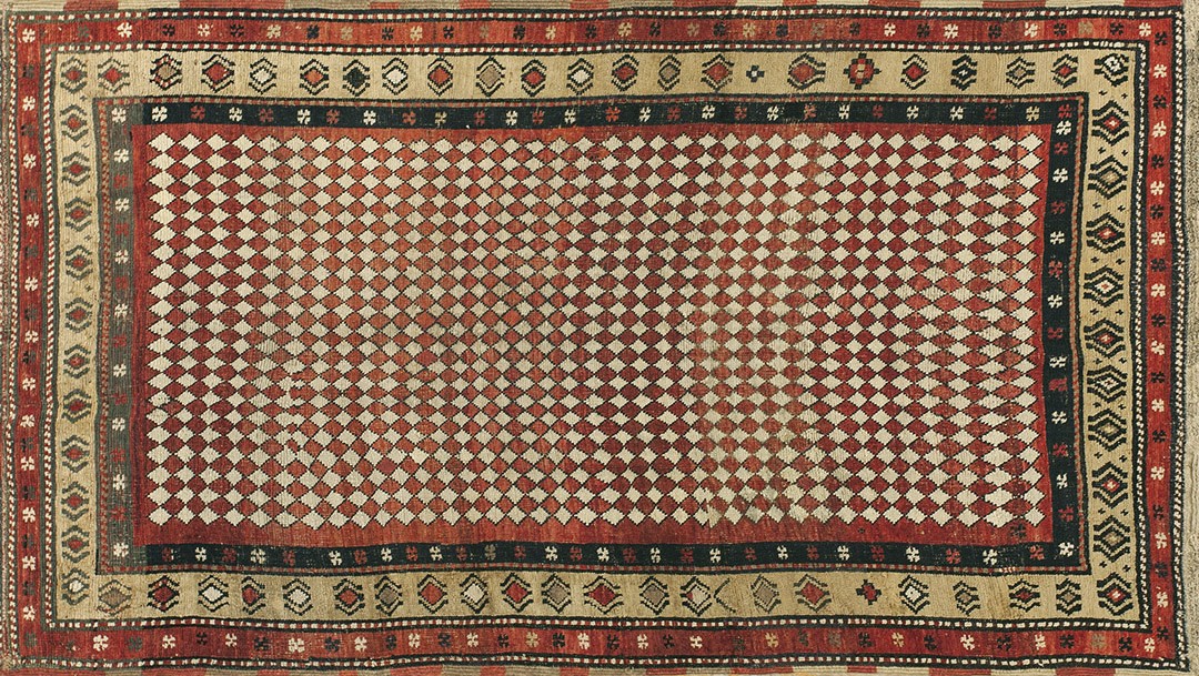 Antique kurdish small scatter size wool persimmon rug