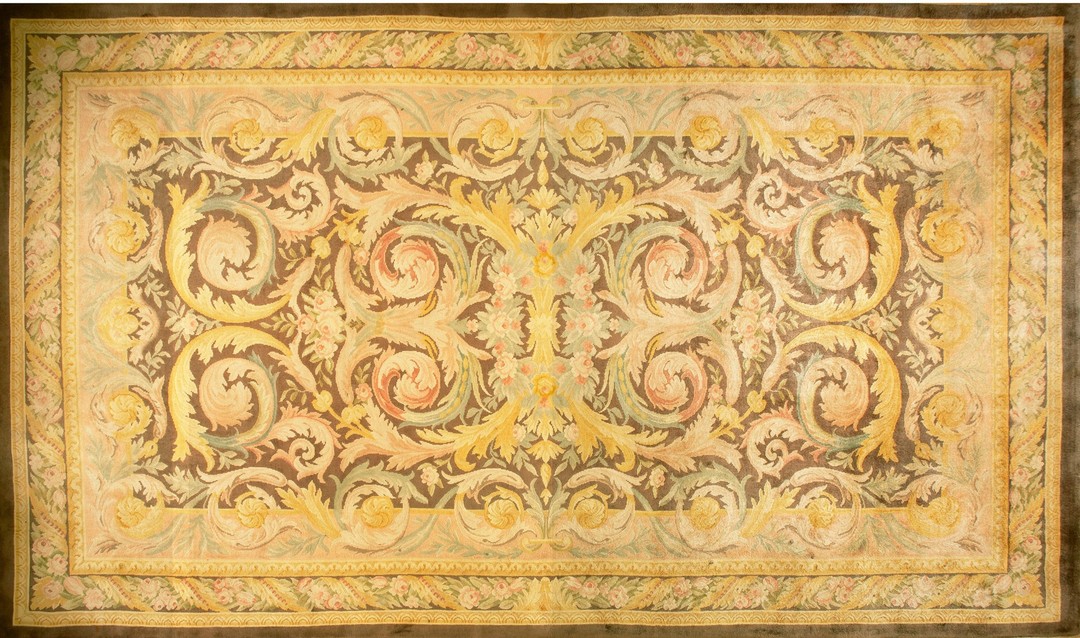 Antique oversized savonnerie french floral knotted rug