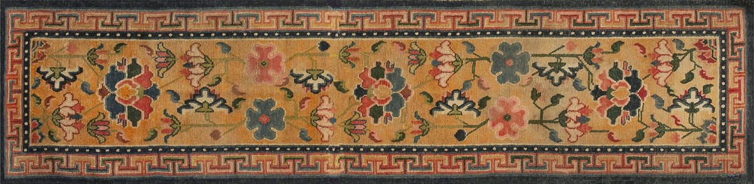 Antique tibetan chinese geometric knotted rug