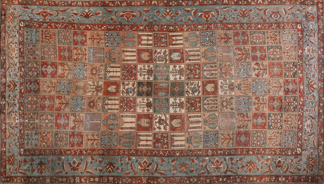Antique large persian geometric knotted rug