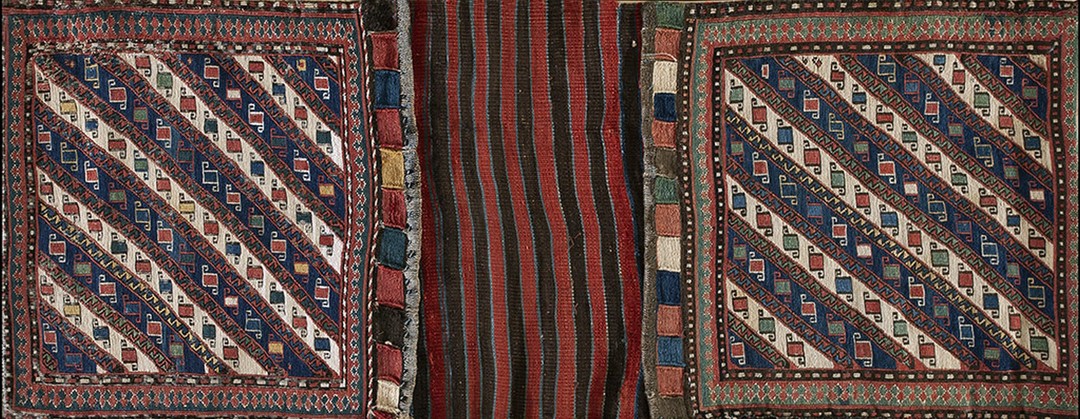 Tribal geometric antique colorful caucasian soumak saddle rug