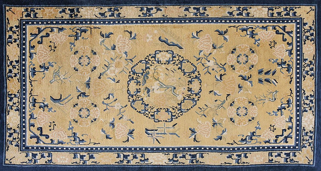 Early 19th century floral antique yellow chinese ningxia rug