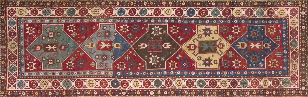 Antique late 19th century tribal geometric caucasian jewel tone rug
