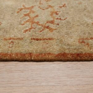 Curled edge of a decorative rug